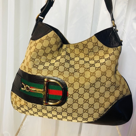 Gucci Handbags - Gucci Bag in beige and brown.